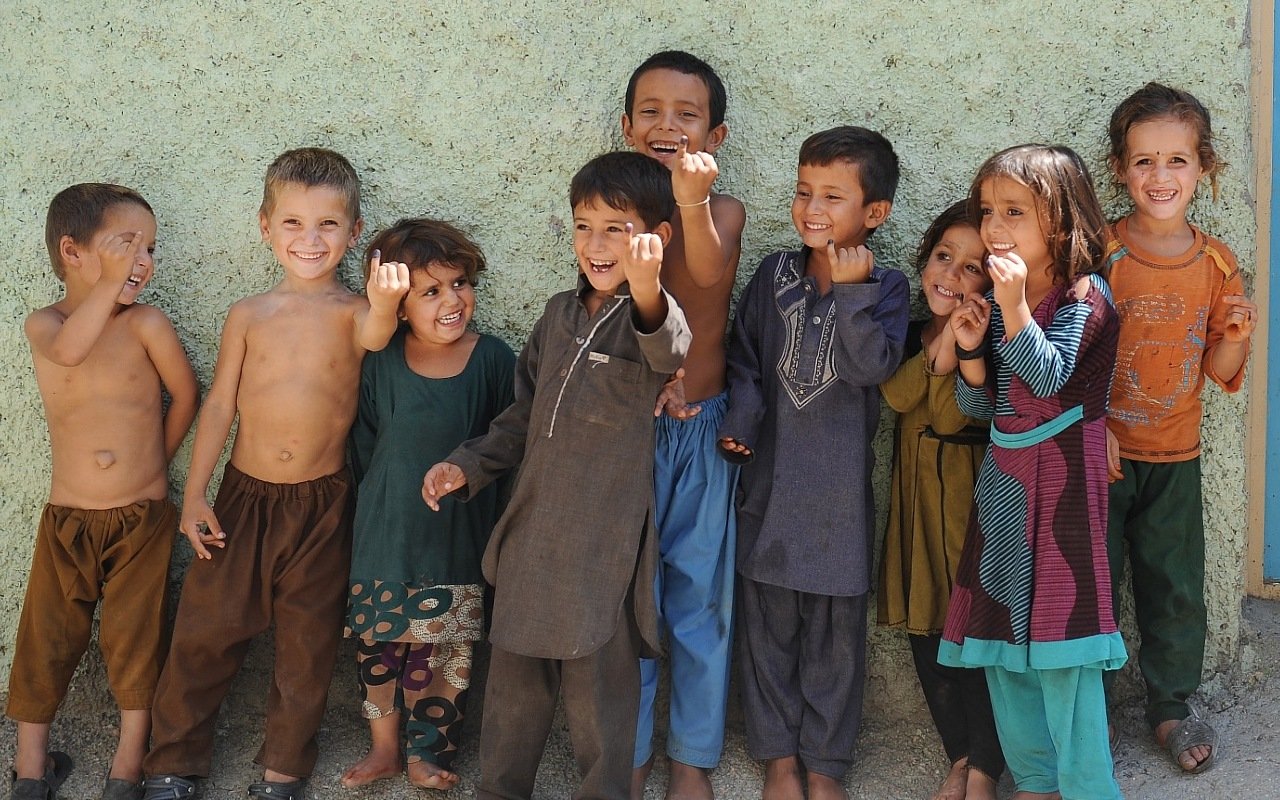Workforce testimonials thumb Afghan children show their fingers marked after they all received drops of polio.